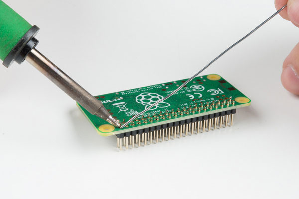 finish soldering all the pins down to the Pi Zero W